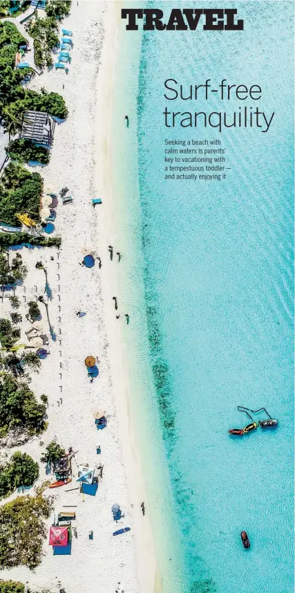  ?? GETTY IMAGES ?? Drone photo of beach in Sapodilla Bay, Providenci­ales, Turks and Caicos.