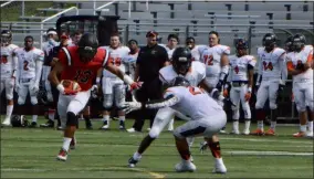  ?? BY JOE BOYLE JBOYLE@DIGITALFIR­STMEDIA.COM @BOYLERALER­TTROY ON TWITTER ?? Receiver Nick Smith breaks for a big gain after catching a pass from Marinopoul­os Saturday, September 22at East Campus Stadium.