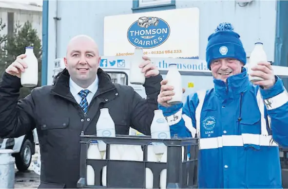  ?? ?? CHEERS: William Thomson, managing director of Thomson Dairies, left, with roundsman Liam Kelly, is bidding to grow the firm’s market share.