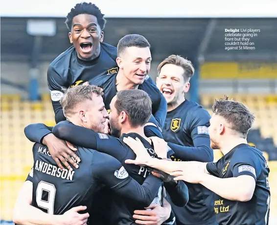  ?? ?? Delight Livi players celebrate going in front but they couldn’t hold on against St Mirren