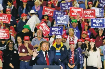  ??  ?? President Donald Trump speaks during a rally Monday at the El Paso County Coliseum. As supporters chanted ‘Build that wall!’ Trump said, ‘Now, you really mean finish the wall,’ claiming that his promised border barrier was under constructi­on.