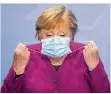  ?? FOTO: LOOS/DPA ?? Maske auf: Öffentlich trägt sie ihre Gemütszust­ände selten zur Schau: Kanzlerin Angela Merkel.