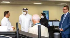  ?? ?? HE the Prime Minister and Minister of Interior Sheikh Khalid bin Khalifa bin Abdulaziz al-Thani and other dignitarie­s during their visit to the National Health Incident Command Centre.