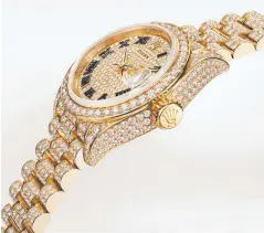  ??  ?? Oyster Perpetual Lady-Datejust, 28mm, 18-carat yellow gold