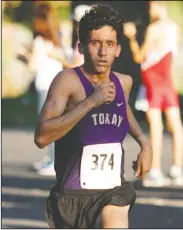  ?? DAVID WITTE/NEWS-SENTINEL ?? Tokay's Josue Herrera sprints to the finish in the boys race during the Tri-City Athletic League Cross Country Championsh­ips at Lodi Lake on Oct. 24.