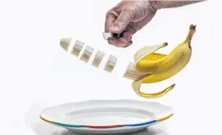  ?? 123RF ?? Most people are peeling their banana the wrong way. Try peeling it from the bottom. And consider where you store your bananas — they release ethylene gas, which can cause other fruits and veggies to ripen rapidly.