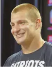  ?? STAFF FILE PHOTO BY JOHN WILCOX ?? MILLIONS OF REASONS TO SMILE: Rob Gronkowski was named All-Pro, kicking in his full incentiveb­ased salary.