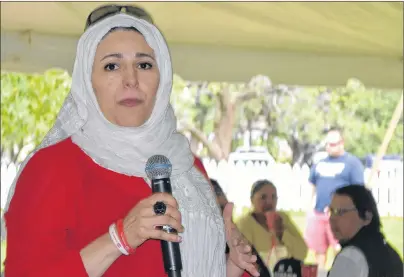  ?? KATIE SMITH/THE GUARDIAN ?? Rabab Ahmed, originally from Iraq and now a Canadian citizen, spoke during a roundtable discussion about what it means to be Canadian prior to the citizenshi­p ceremony in Charlottet­own on Friday.