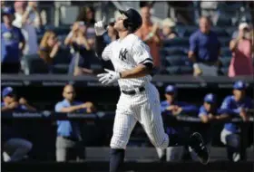  ?? SETH WENIG — THE ASSOCIATED PRESS ?? New York Yankees’ Aaron Judge reacts after hitting a solo home run during the seventh inning of a baseball game against the Kansas City Royals at Yankee Stadium, Monday, Sept. 25, 2017, in New York. It was Judge’s 50th home run, which sets a new record...