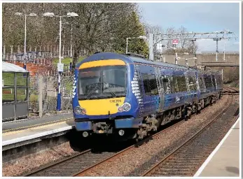  ?? DAVID RAPSON. ?? 170396 calls at Croy with an eastbound working on April 16 2016. Class 170s have operated the service for nearly 20 years.