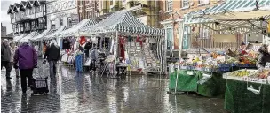  ??  ?? Stockport Market, the April image from the Vernon Building Society’s 2015 calendar