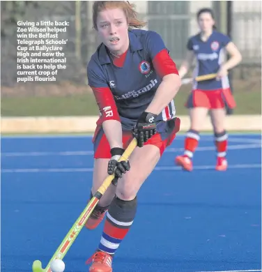  ??  ?? Giving a little back: Zoe Wilson helped win the Belfast Telegraph Schools’ Cup at Ballyclare High and now the Irish internatio­nal is back to help the current crop of pupils flourish