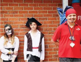  ??  ?? Lillie Brown, Jack Tobin and Ajay Smart show their impressive pirate costumes.