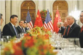  ?? Pablo Martinez Monsivais / Associated Press ?? President Trump met with China President Xi Jinping (second from left) at the G20 Summit in Buenos Aires, but uncertainl­y lingers.