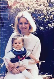  ?? CONTRIBUTE­D ?? David Miller with his mom in 1986. Miller practices constructi­on litigation, just like his mom.