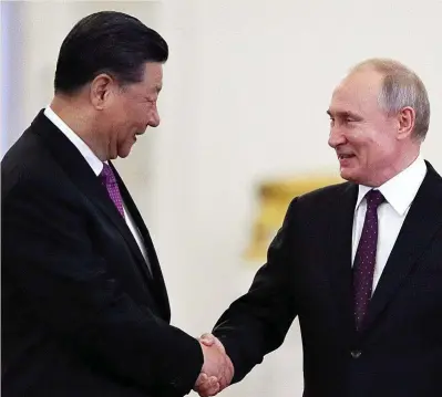  ?? ?? El presidente chino, Xi Jinping, junto a su homólogo ruso, Vladímir Putin.