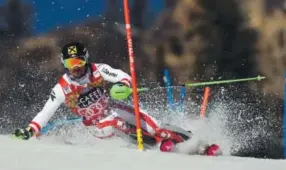  ??  ?? Marcel Hirscher, of Austria, makes his first run of the World Cup slalom race Sunday during the World Cup Finals at Aspen Mountain. Hirscher finished fourth in the race but was the overall World Cup champion. Helen H. Richardson, The Denver Post
