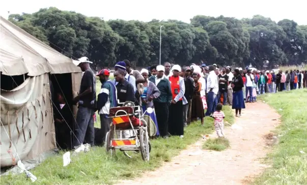  ?? ?? In this file photo, people queue to vote during previous elections. Since independen­ce, the country has religiousl­y stuck to its electoral calendar