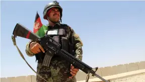  ?? EPA ?? An Afghan soldier secures a military base after overnight clashes with Taliban militants in the Khakriz district of Kandahar