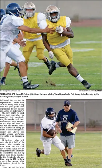  ?? Buy these photos at YumaSun.com PHOTOS BY RANDY HOEFT/YUMA SUN ?? YUMA CATHOLIC’S Jamar McFarlane (right) turns the corner, eluding Yuma High defender Zach Moody during Thursday night’s scrimmage at Ricky Gwynn Stadium.