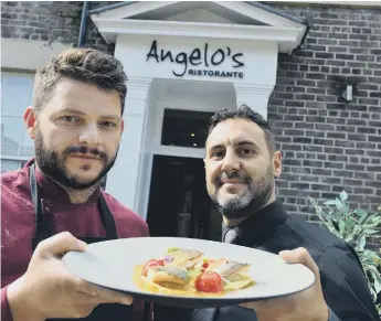  ??  ?? Angelo’s Ristorante owners chef Nello Russo and front of house Federico Trulli (right)