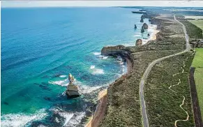  ?? — Tourism Australia ?? Check out the craggy limestone spires of the Twelve Apostles along the Great Ocean road.