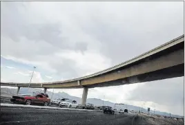  ?? Patrick Connolly ?? A 60-foot-tall flyover bridge linking the westbound 215 Beltway and southbound U.S. Highway 95 is scheduled to open Wednesday afternoon.