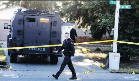  ?? DAVID BLOOM ?? Police and forensics work at the scene of an officer involved shooting near in Edmonton in 2017. ASIRT is called in in such cases.