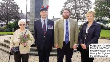  ??  ?? Poignant Chrissie Mitchell, Billy Whytock, Robert Whytock and Wendy Symington at the War Memorial