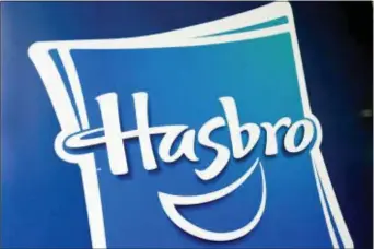  ?? RICHARD DREW — THE ASSOCIATED PRESS FILE ?? This file photo, shows the Hasbro logo at the TTPM 2018 Spring Showcase, in New York. Hasbro Inc. (HAS) on Monday, Oct. 22, reported third-quarter earnings of $263.9 million.
