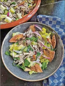  ?? GRETCHEN MCKAY / PITTSBURGH POST-GAZETTE ?? Fattoush is a chopped Levantine salad made with stale pita. This includes shredded chicken tossed in a citrusy tahini-sumac dressing.