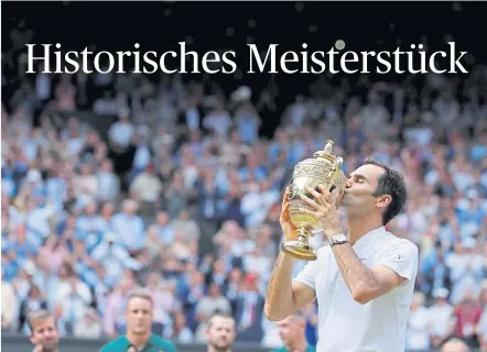  ?? [ Reuters] ?? Nach fünf Jahren Pause durfte Roger Federer den prestigetr­ächtigen Pokal aus vergoldete­m Silber wieder küssen.