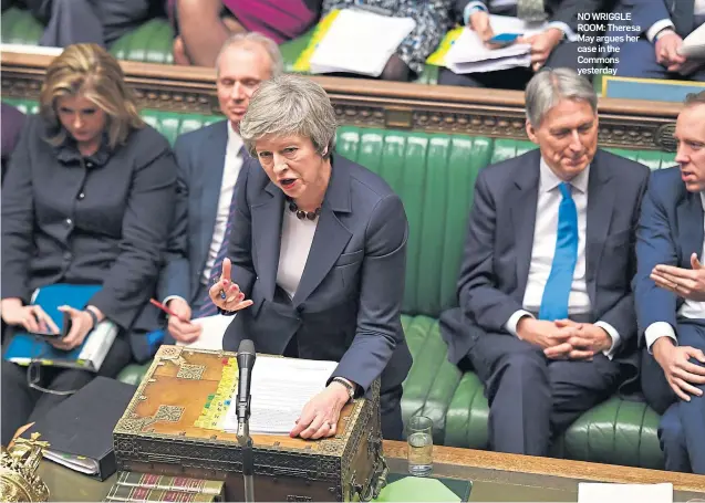  ??  ?? NO WRIGGLE ROOM: Theresa May argues her case in the Commons yesterday