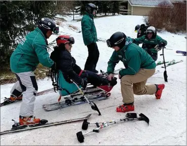  ?? PROVIDED ?? A wounded veteran sits on skiing apparatus that doesn’t require the use of his legs during Friday’s event at Windham Mountain in Greene County.