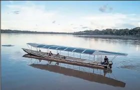  ?? Photo courtesy Kara Solar ?? The Tapiatpia, a 20 person solar-powered canoe, connects nine Achuar communitie­s spanning 67 kilometers of the Pastaza and Capahuari Rivers in the Ecuadorian Amazon.