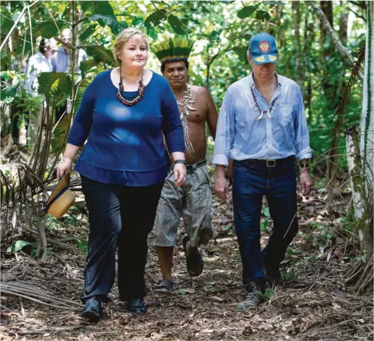  ?? FOTO: NTB SCANPIX ?? MOTTAKER: I fjor besøkte statsminis­ter Erna Solberg (H) regnskogen i Amazonas på grensen til Brasil. Brasil er det landet som mottok mest norsk langsiktig bistand i 2018.