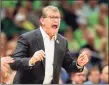  ?? Mike Ehrmann / Getty Images ?? Coach Geno Auriemma and the UConn women’s basketball team won’t face rival Notre Dame this season.