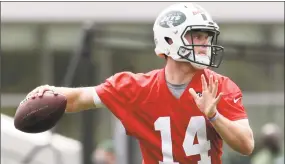  ?? Julio Cortez / Associated Press ?? Sam Darnold works out during NFL rookie camp last Saturday, in Florham Park, N.J.