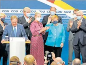  ?? ?? El CDU del candidato Armin Lashet y Angela Merkel no se dio por derrotado