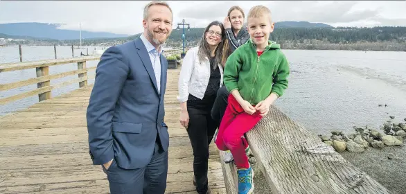  ?? ARLEN REDEKOP ?? Port Moody-Coquitlam MLA Rick Glumac takes a March stroll at Rocky Point with wife Nathania Vishnevsky, daughter Xylia, 12, and son Nico, 6. Glumac recently had surgery for prostate cancer after a blood test revealed he had an elevated PSA score.