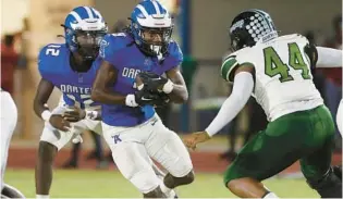  ?? STEPHEN M. DOWELL/ORLANDO SENTINEL ?? Apopka running back Nathan Jenkins III (3) runs past Evans defensive end Jermaine Thomas (44) during the Evans High at Apopka High varsity football game on Friday night.