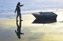  ??  ?? A fisherman over the ice on Lake Van.