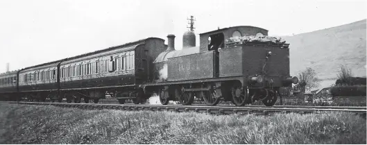  ??  ?? The Leeds and Bradford to Morecambe residentia­l trains were a common sight along the Aire valley and on 29 February 1936 ex-L&YR ‘1008’ class 2-4-2T No 10631 is seen near Cononley as it works the Bradford portion of one of these workings to Skipton, where it will be joined by the Leeds portion and worked through to its destinatio­n by a larger locomotive, a ‘2P’ or ‘3P’ 4-4-0 or a Compound, rostered by Leeds Holbeck shed. No 10631 emerged from Horwich Works in April 1890 as L&YR No 1033 and it would enter British Railways stock as No 50631, but never carried this number as withdrawal came in November 1948. Some 13 years after the grouping, No 10631 still carries early LMS livery.