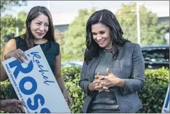  ?? BRIAN VAN DER BRUG Los Angeles Times ?? RACHEL ROSSI, whose legal background is as a public defender, chats with backers after announcing her run for district attorney last year.