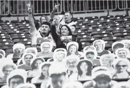  ?? Brett Coomer / Staff photograph­er ?? From the pandemic to the power outages, it’s hard to find a distractio­n in sports.