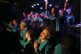  ?? RAY CHAVEZ/STAFF ARCHIVE ?? The Oakland Interfaith Gospel Choir follows artistic director Terrance Kelly, left, during a concert at Sweetwater Music Hall in Mill Valley in 2018.