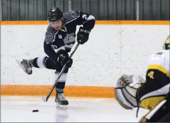  ?? NEWS PHOTO RYAN MCCRACKEN ?? Medicine Hat Travelodge Cubs forward Matt Clement takes a shot during Saturday's Heritage Junior Hockey League game against the Strathmore Wheatland Kings at the Kinplex.