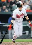  ?? GREG FIUME/GETTY IMAGES ?? Chance Sisco of the Baltimore Orioles has upset the Minnesota Twins by laying down a bunt against the shift.