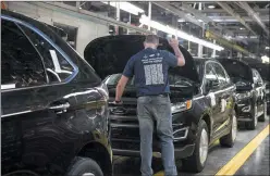  ?? CP PHOTO CHRIS YOUNG ?? New Ford Edges sit on a production line as Ford Motor Company celebrates the global production start of the 2015 Ford Edge at the Ford Assembly Plant in Oakville, Ont., on Thursday, February 26, 2015. The Canadian and Mexican government­s are pressing...