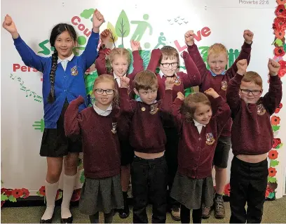  ?? ?? St Nicholas CE Primary School, Church, celebratin­g its good Ofsted